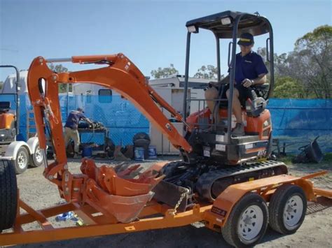 aluminium mini excavator trailer|unloading mini excavator on trailer.